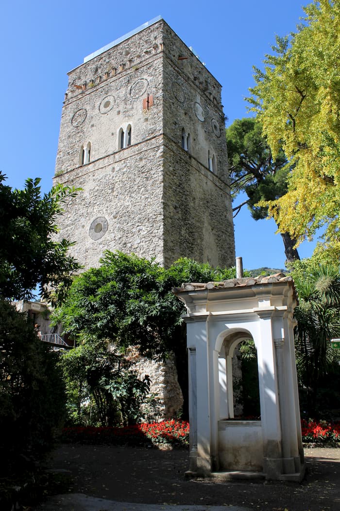 Tall stone tower with well below