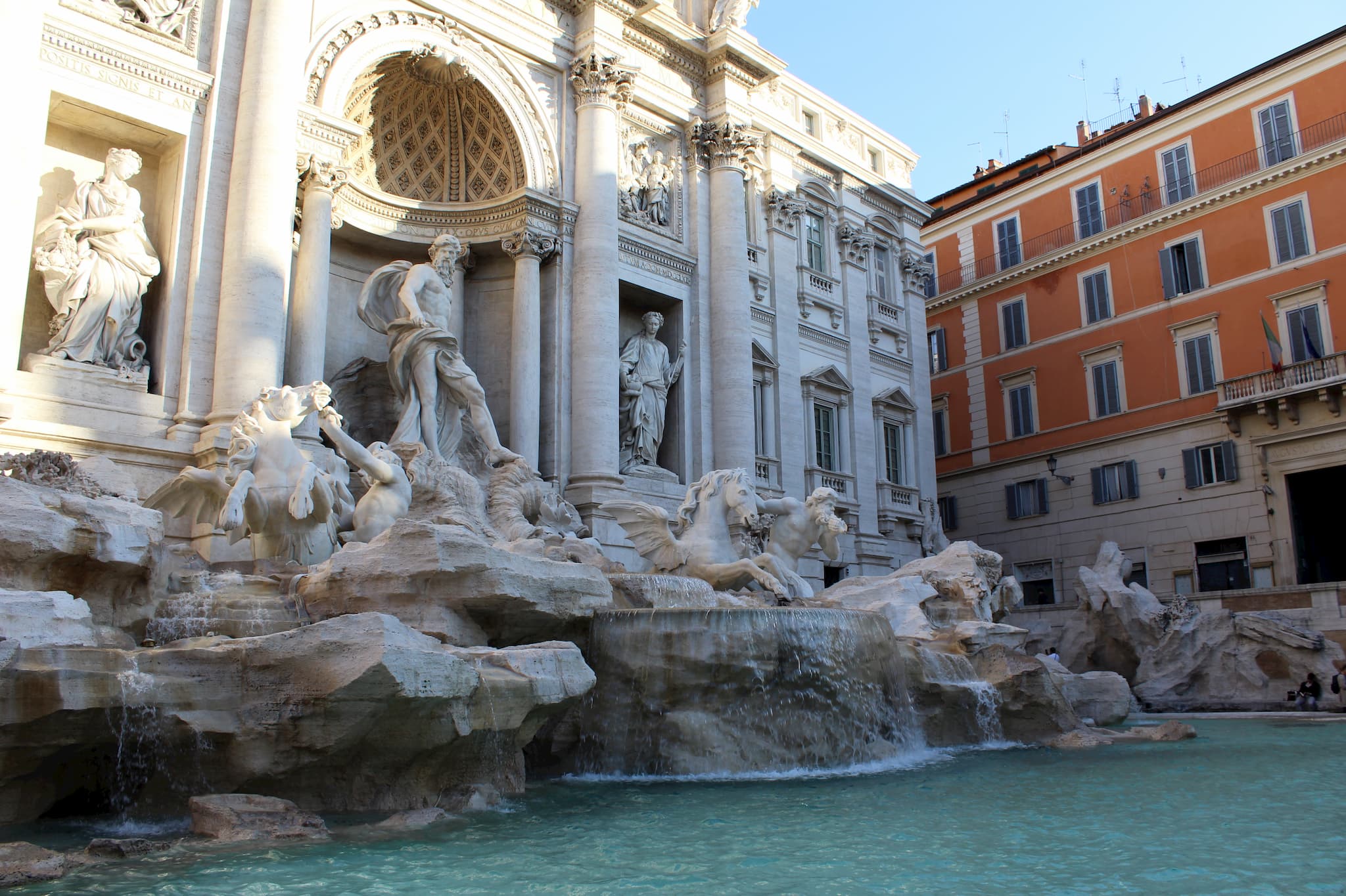 Ornate marble carvings of the Trevi Fountain.