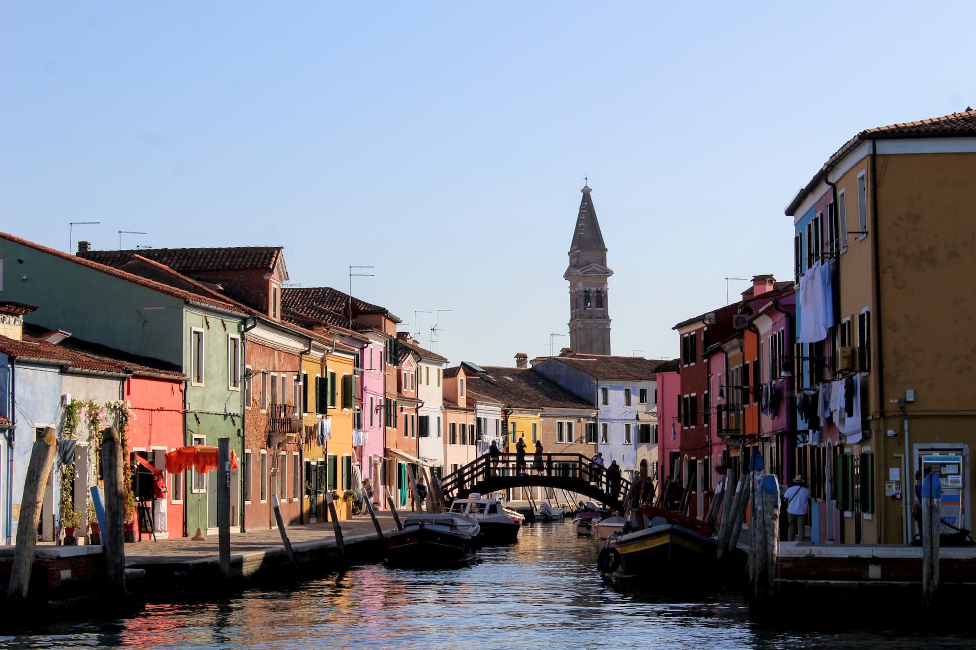 Row of colorful houses along a canal.