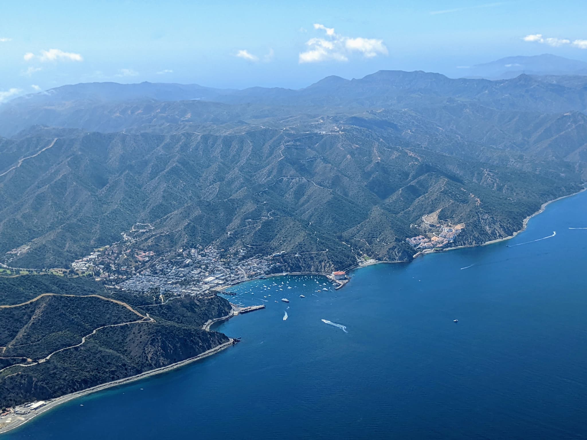 Looking down on a small harbor in a valley.