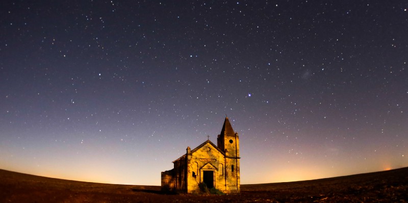 church against starry night