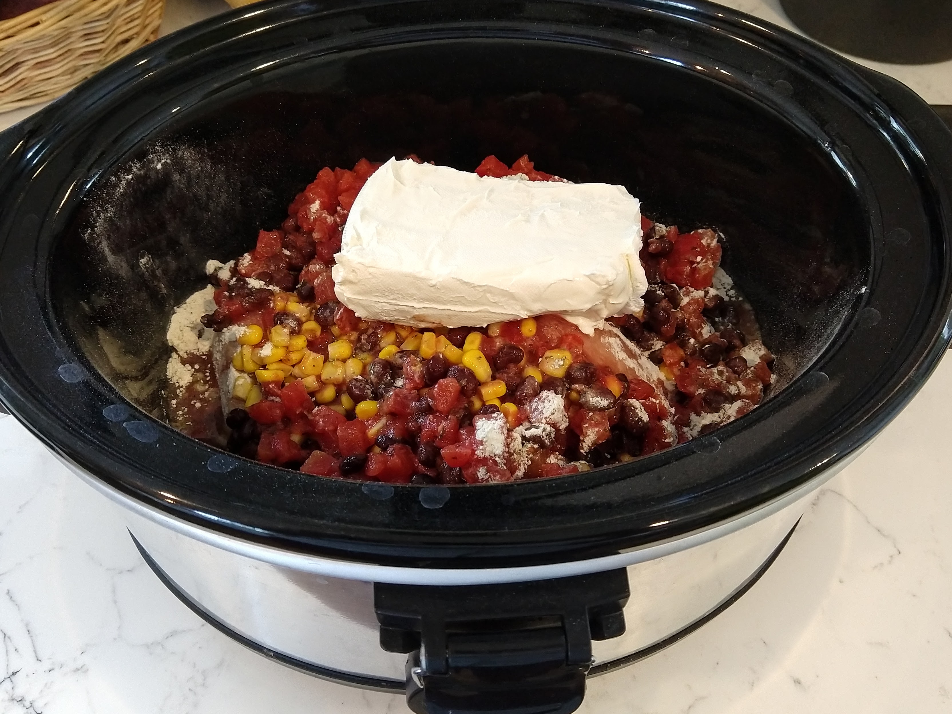 Raw ingredients in a slow cooker.