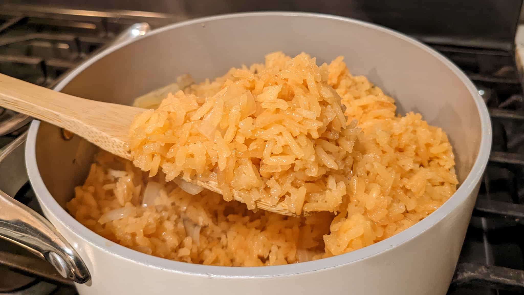 pot with orange tinted rice