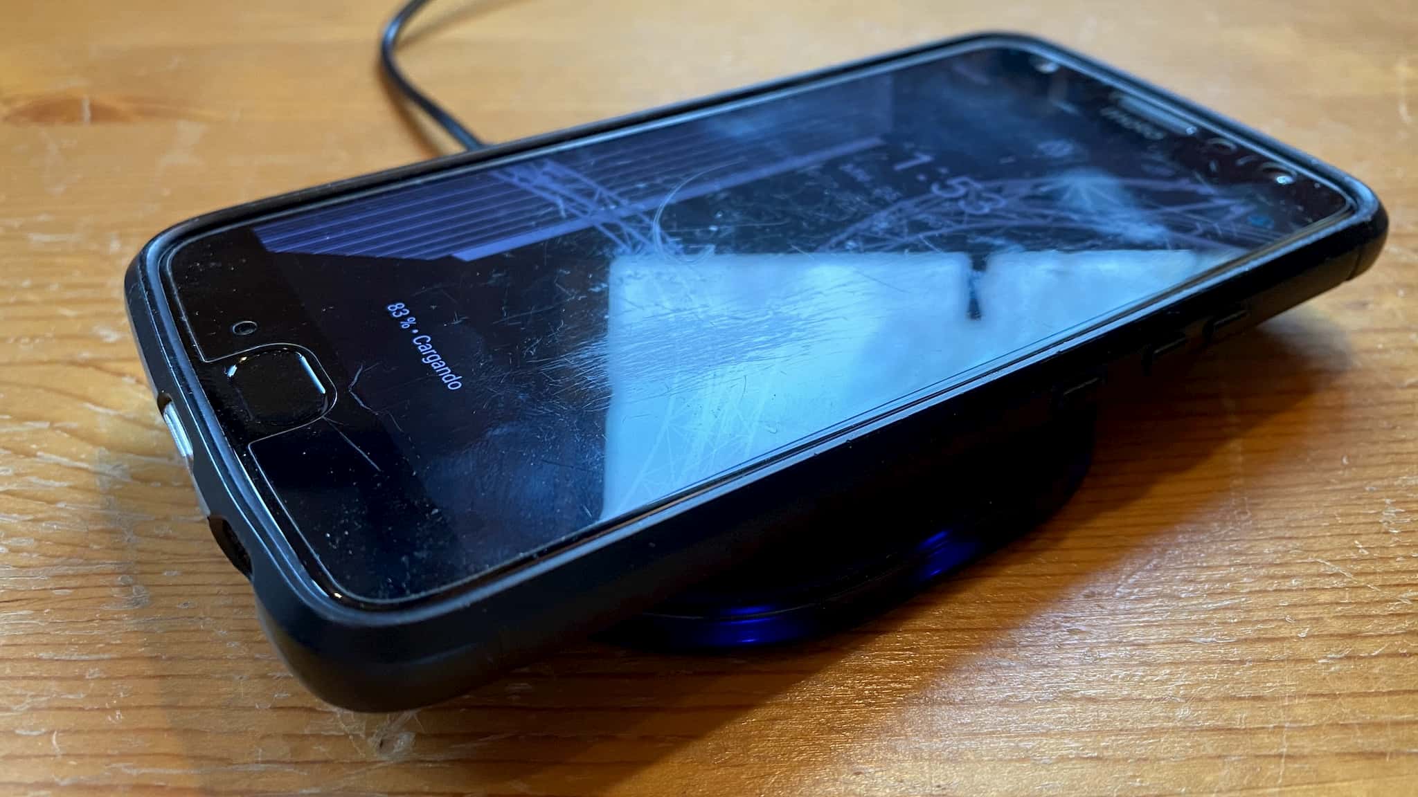 Phone sitting on wireless charging pad